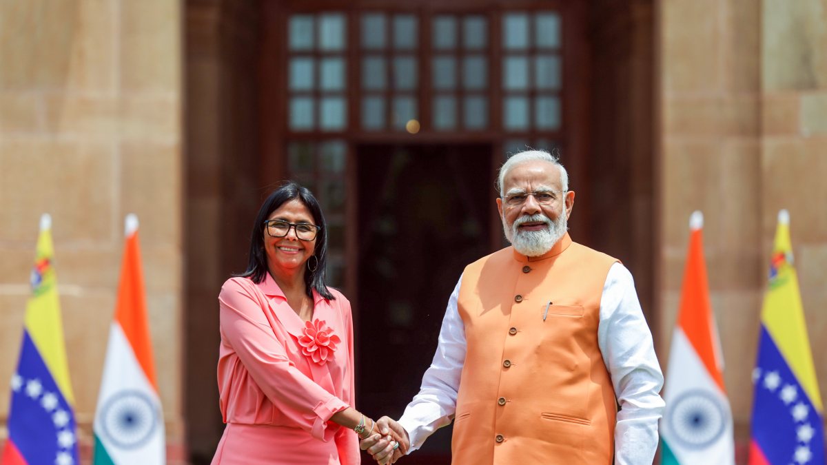 PM Modi shakes hands with Venezuela's acting president Delcy Rodriguez