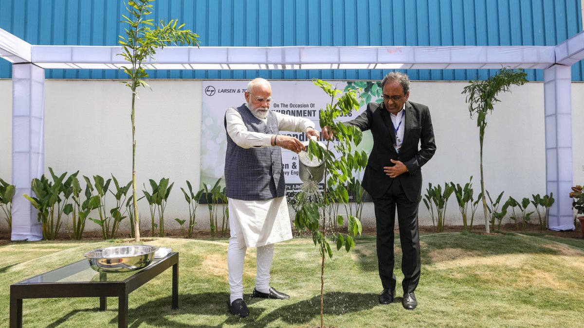 PM Modi waters sapling at L&T Hazira plant on World Environment Day