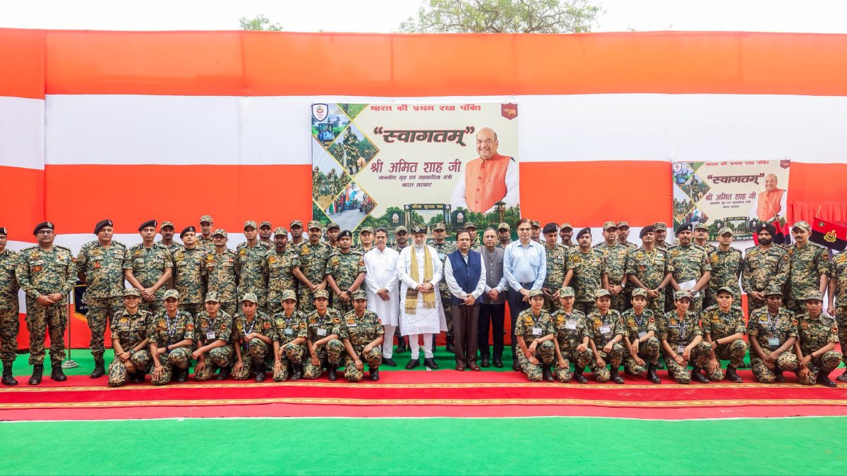Union Home Minister Amit Shah and Tripura CM Manik Saha pose for a picture with…