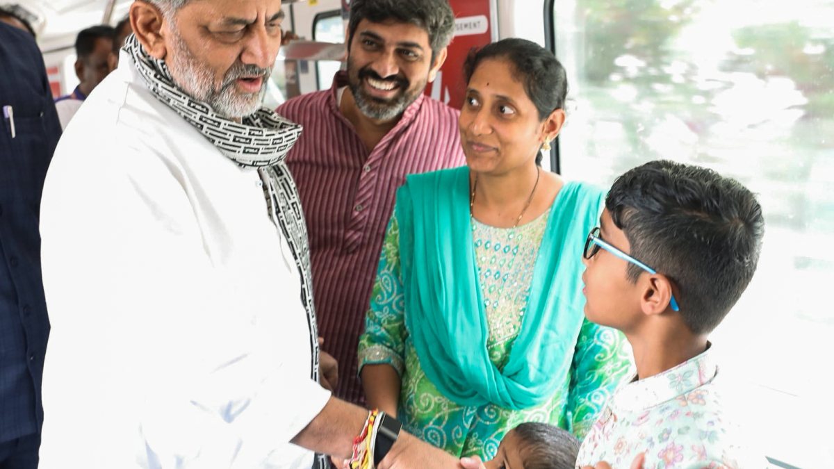 Karnataka CM Shivakumar travels by Namma Metro with children