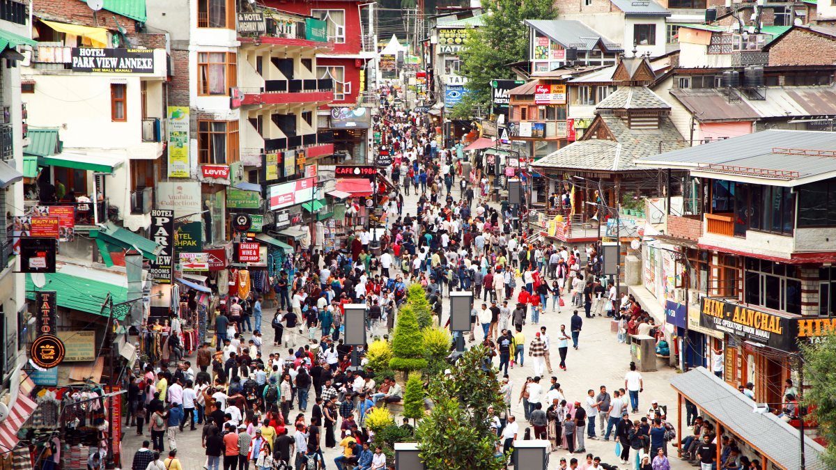 Tourists throng for shopping at Manali's Mall Road during pleasant weather in…
