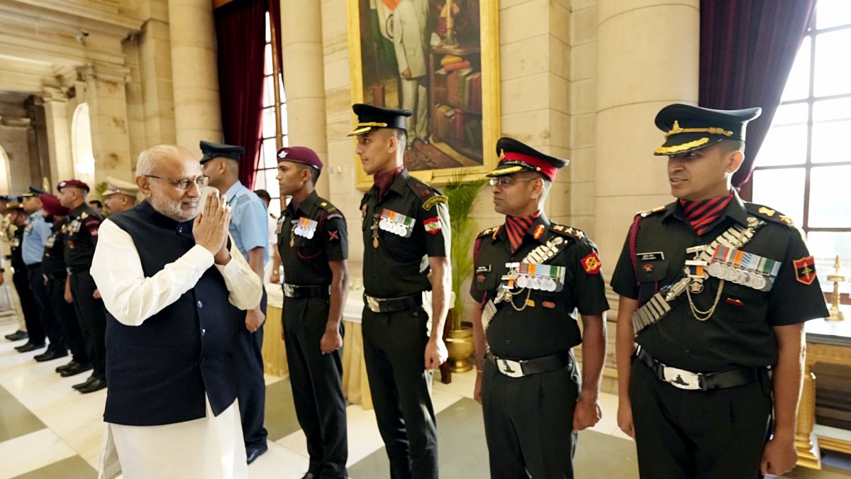 Vice President C.P. Radhakrishnan greets during the Defence Investiture…