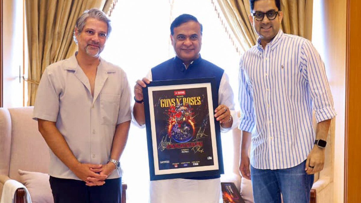 Assam CM Sarma poses with Guns N' Roses poster ahead of Guwahati show