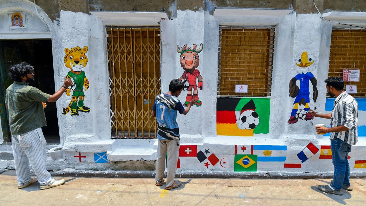 Artists paint FIFA World Cup mural on Kolkata wall