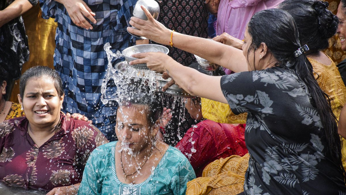 Devotees take holy dip in Tapi River on Ekadashi of extra month