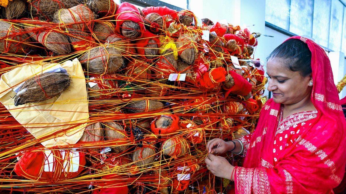 Devotees perform rituals on Parama Ekadashi at Baba Khatu Shyam Temple in Bikaner