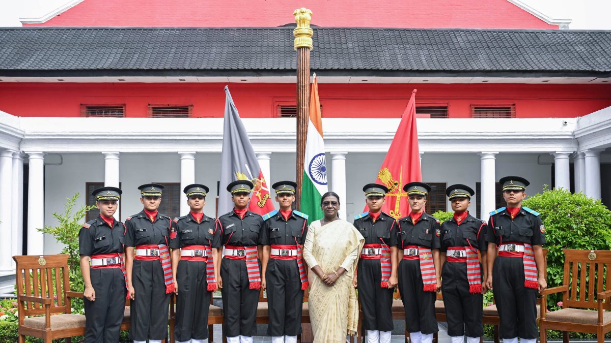 President Murmu with new cadets at IMA passing out parade