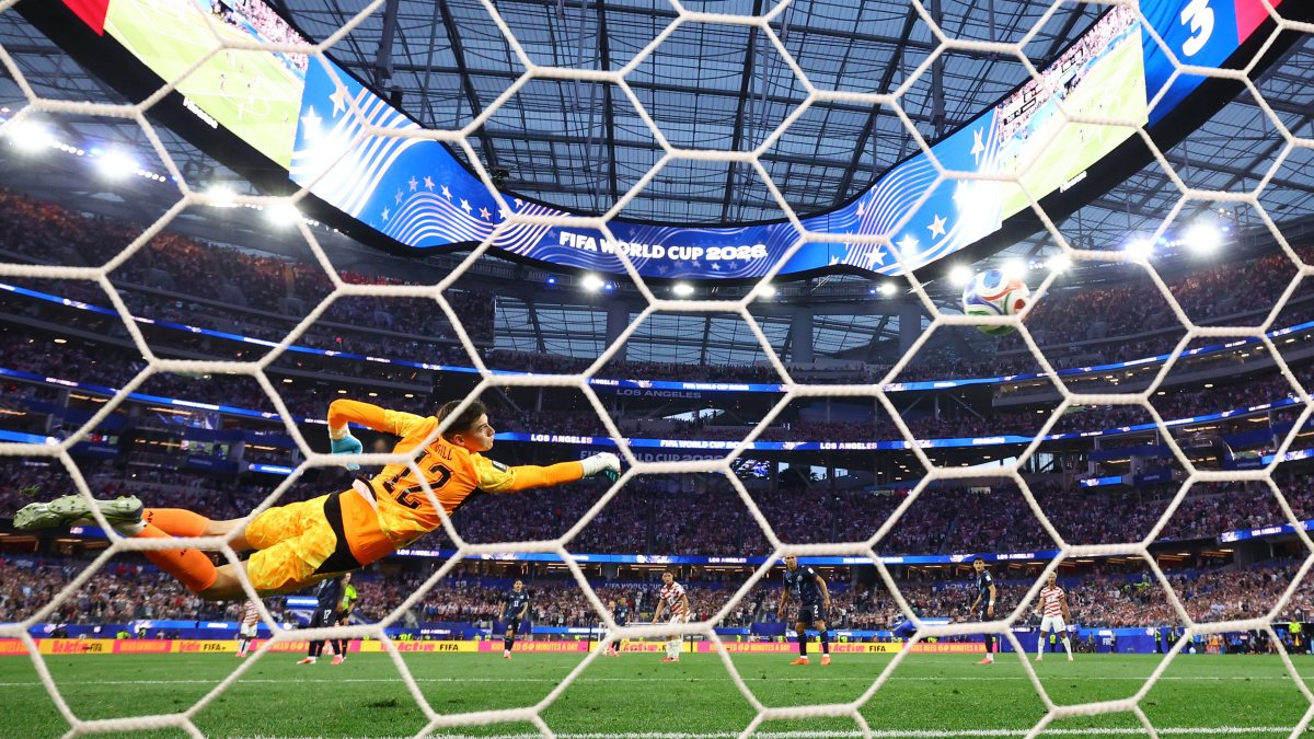 Paraguay goalkeeper Orlando Gill dives to save USMNT goal