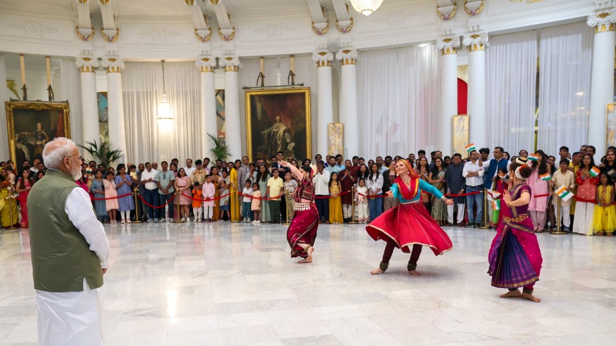 Prime Minister Narendra Modi witnesses a cultural performance by artist as a…