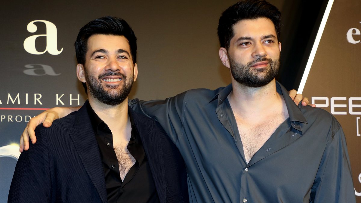 Karan Deol and Rajveer Deol pose at Aamir Khan's production house 25th anniversary