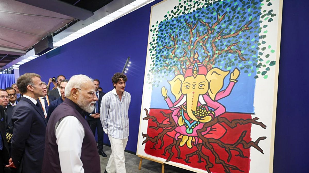 Prime Minister Narendra Modi and French President Emmanuel Macron view the the…
