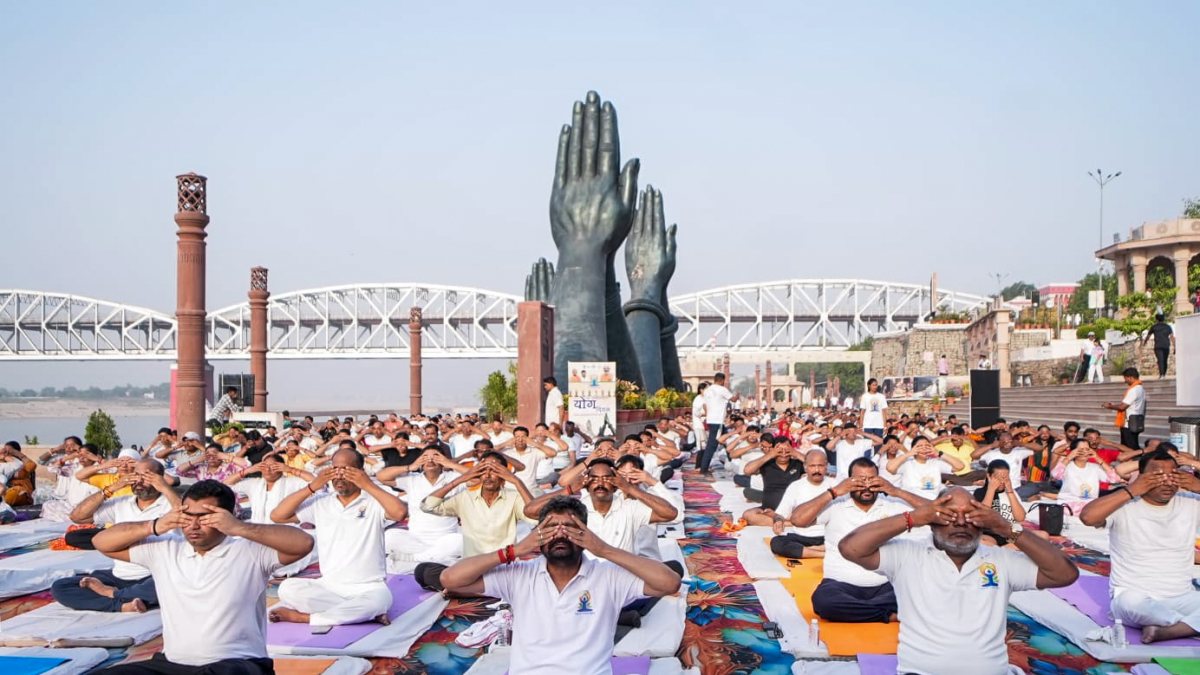 People perform yoga at International Yoga Week inaugural event in Varanasi