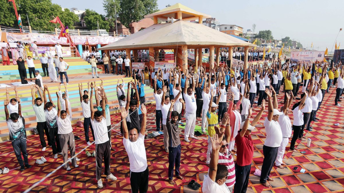 People perform yoga at Prayagraj event ahead of International Yoga Day