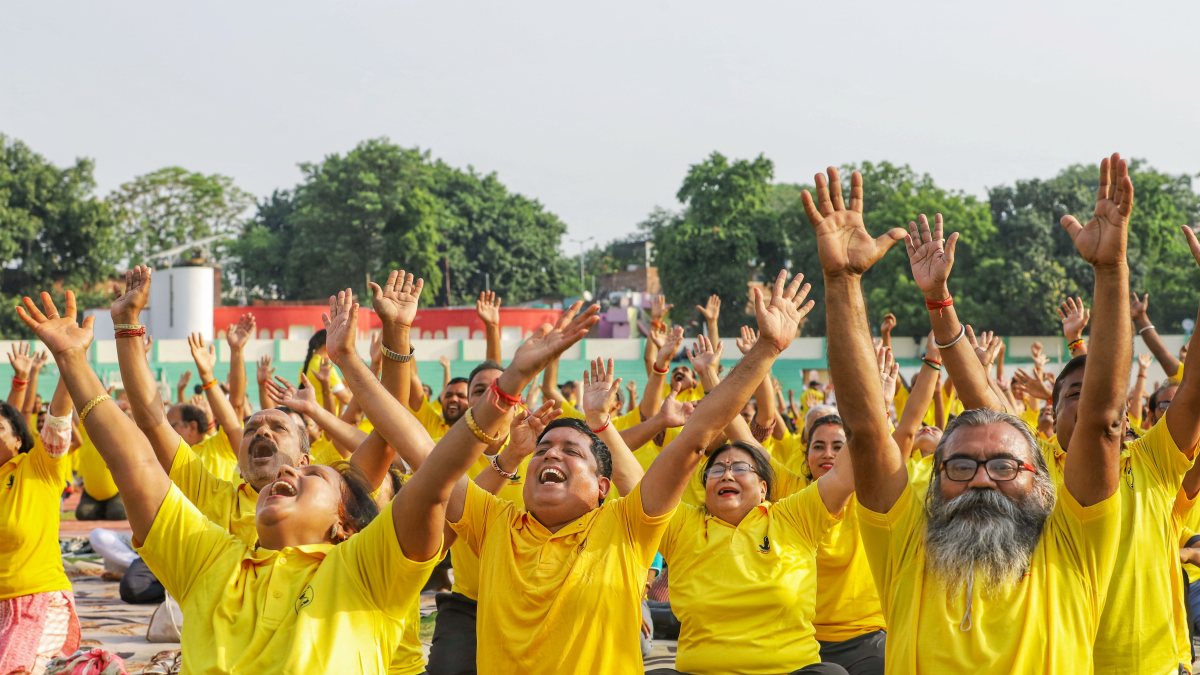 People perform yoga at Lucknow camp ahead of International Yoga Day