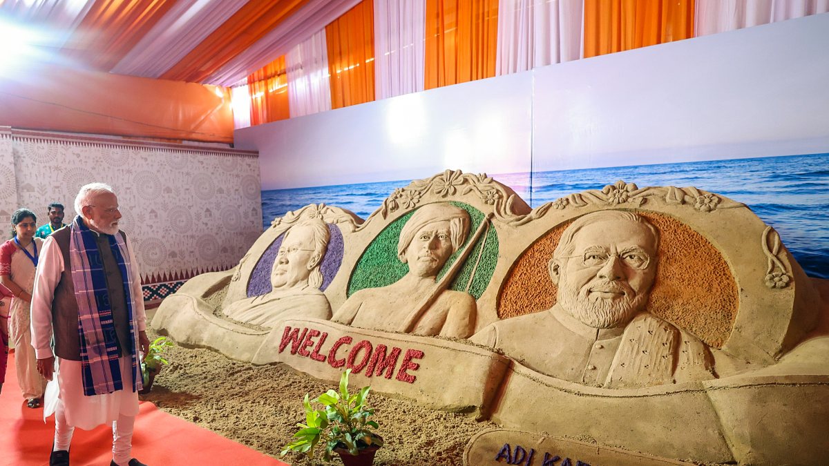 PM Modi views sand sculpture in President Murmu's native village