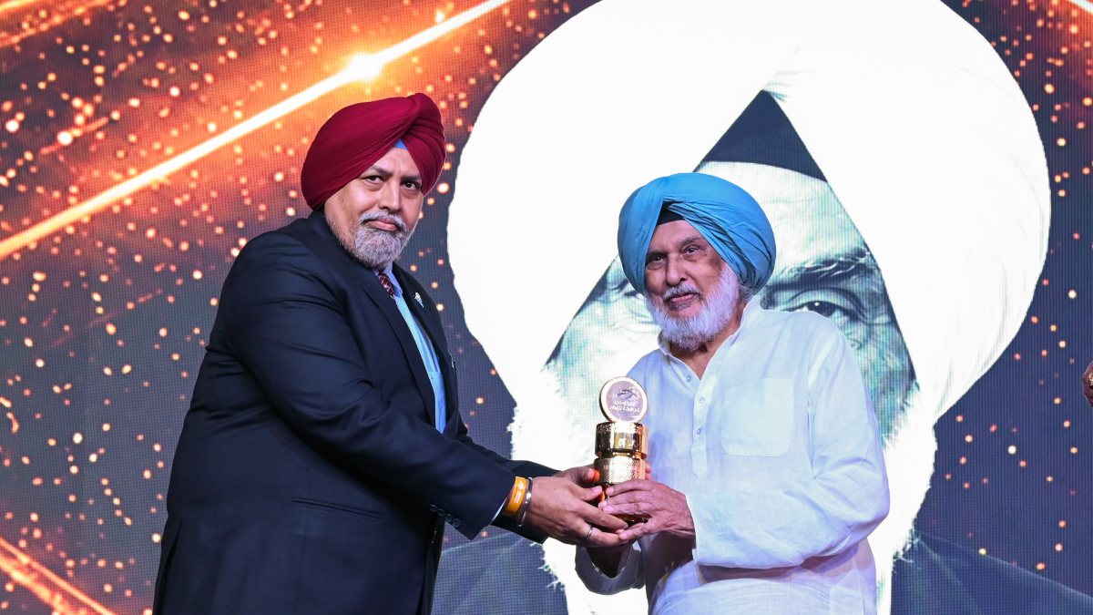 Gurbachan Singh Randhawa receives an award during Indian Athletics Award, in…