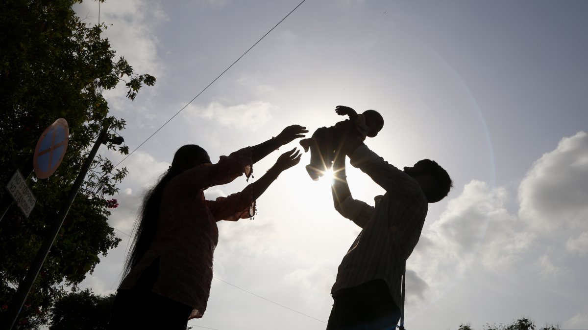 Father and child play together on Father's Day in Ahmedabad