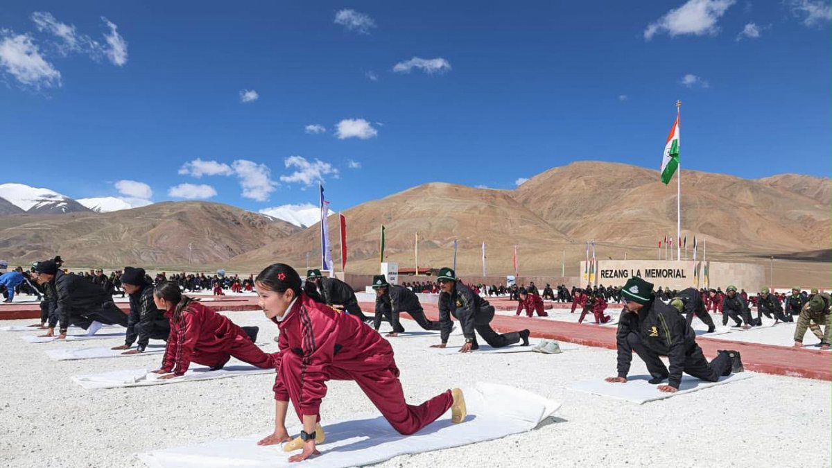 Children and troops practice yoga at Rezang La Memorial in Ladakh