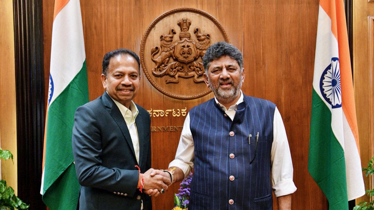 Karnataka Chief Minister DK Shivakumar exchanges a warm handshake with…