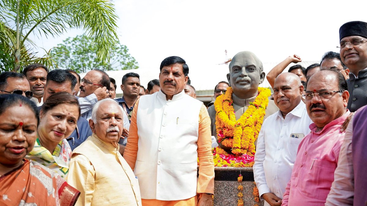Madhya Pradesh Chief Minister Mohan Yadav in a group photo while paying homage…
