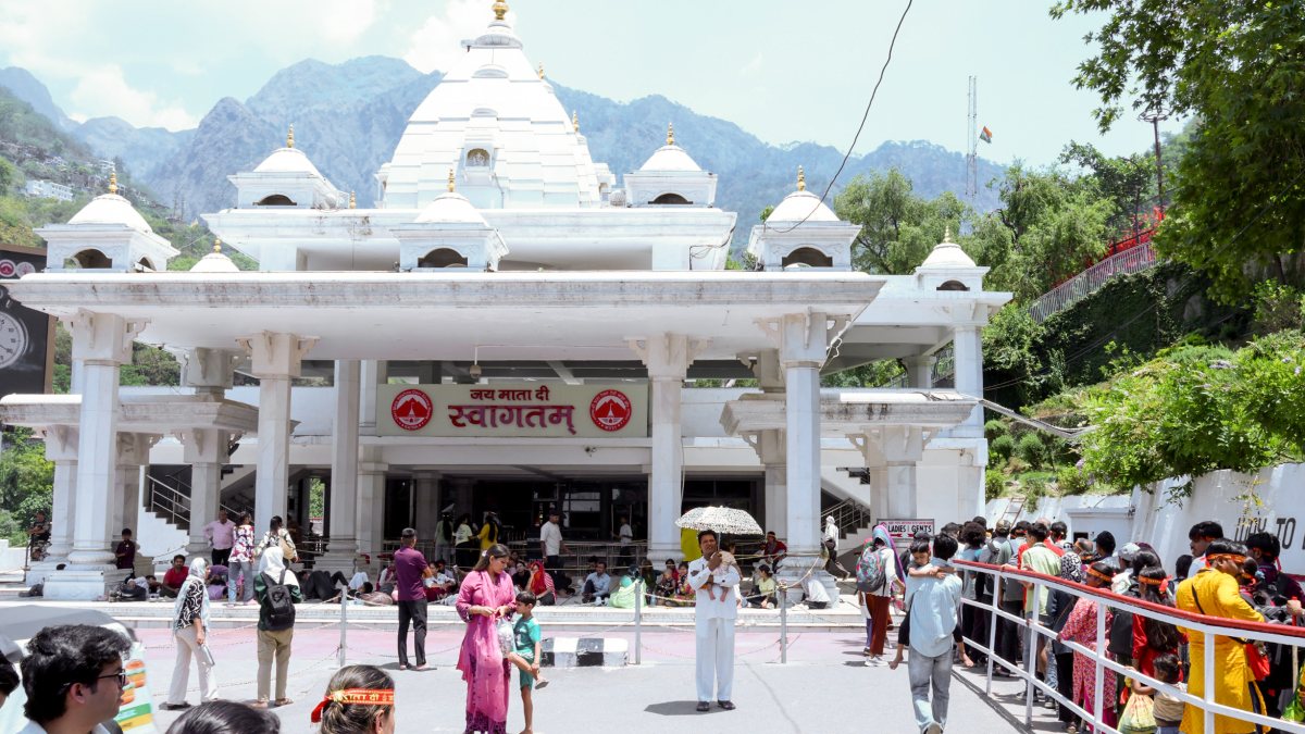 Devotees gather at Mata Vaishno Devi Temple entry gate in Katra