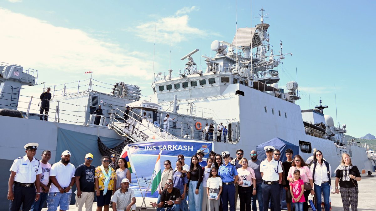 Navy officials in a group photo as INS Tarkash concludes her port call at Port…