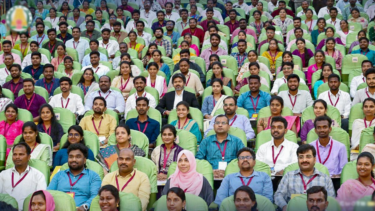 Tamil Nadu CM Vijay poses with 401 new energy department recruits