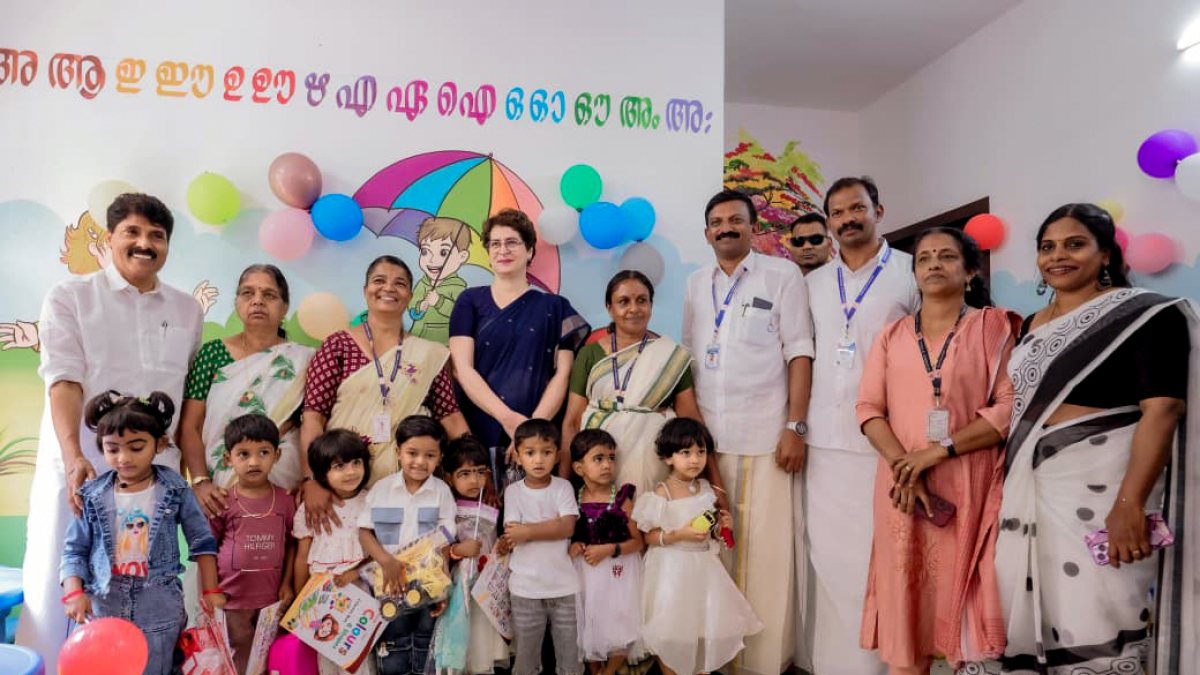Priyanka Gandhi poses for group photo at Smart Anganwadi launch