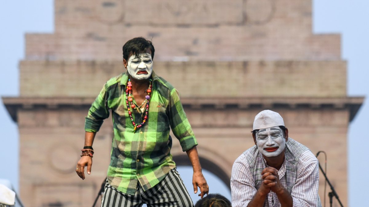 Participants perform at the Delhi Police's anti-drug awareness event on the…