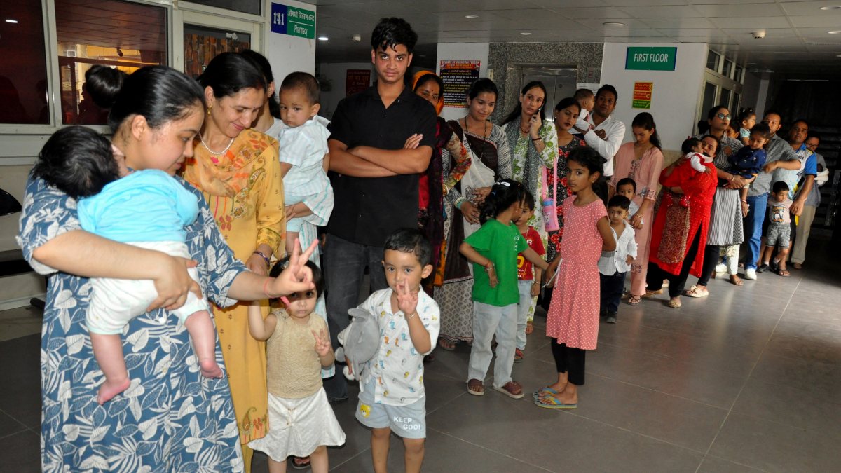 Children queue for Pulse Polio immunisation in Kullu