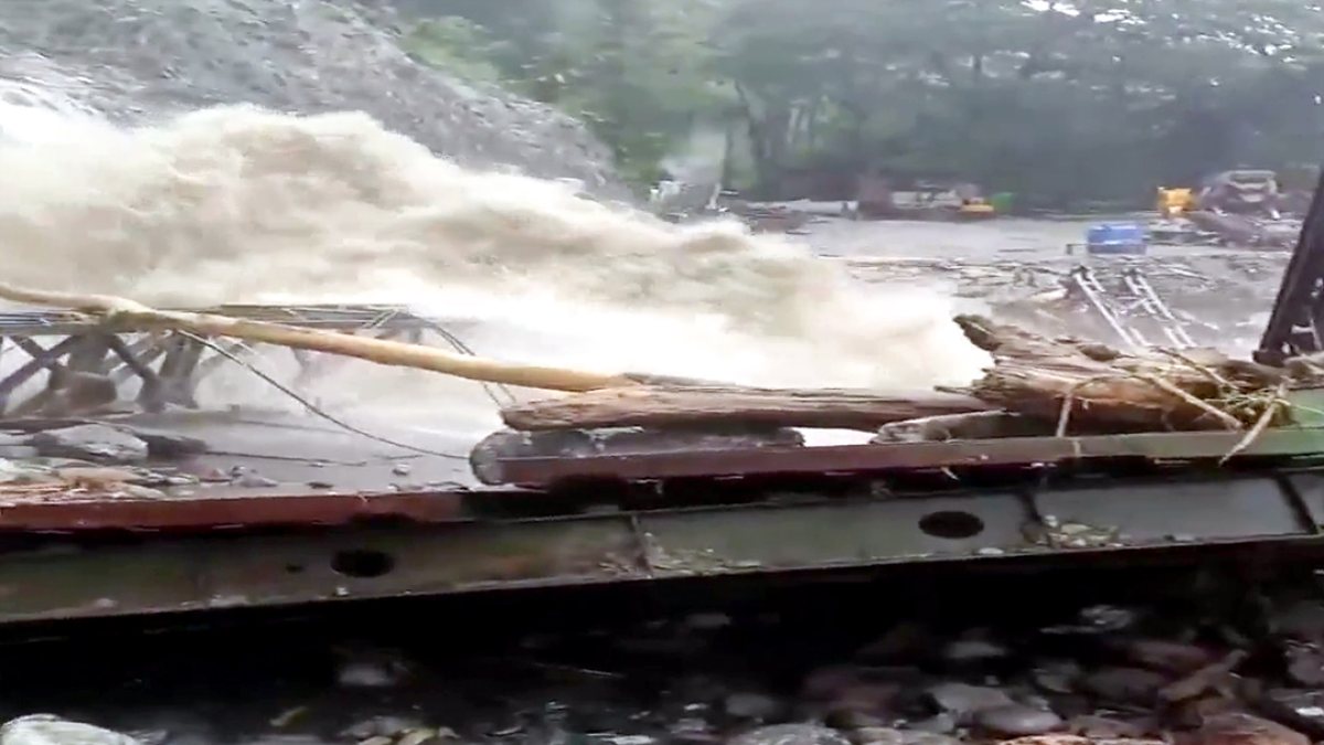 A Bailey Bridge over Phee Khola at Phidang in North Sikkim lies damaged and…