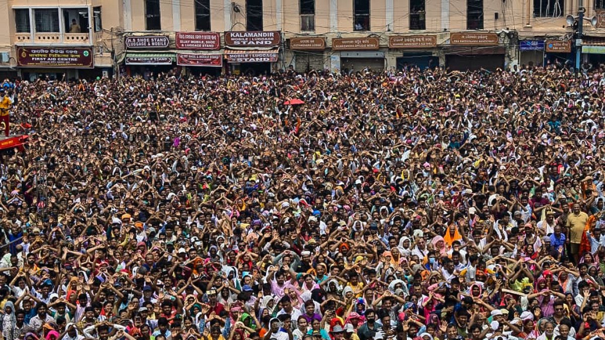 Devotees throng the Jagannath Dham during the Snana Yatra of Lord Jagannath and…