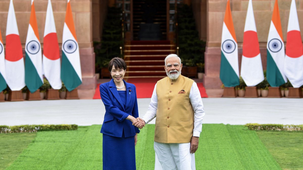 Modi shakes hands with Japan PM Takaichi at Hyderabad House