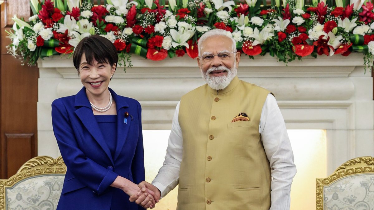 Modi and Japan PM Takaichi shake hands ahead of bilateral talks
