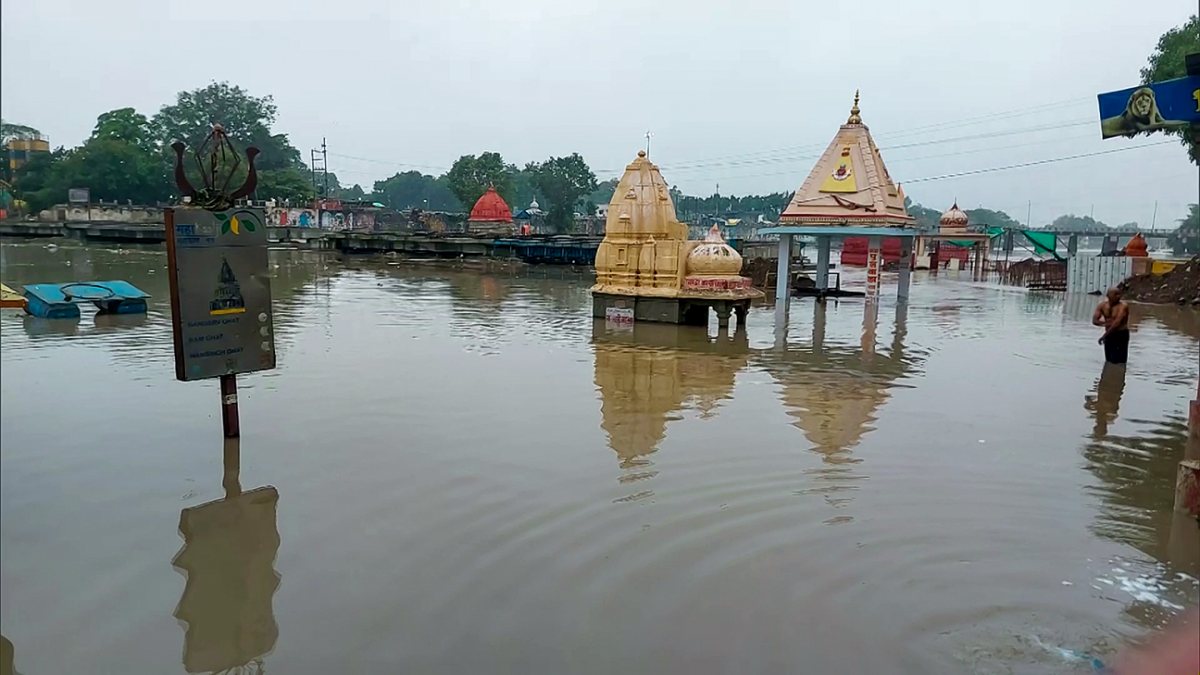 A view of partially submerged temples near Ram Ghat as the water level of the…