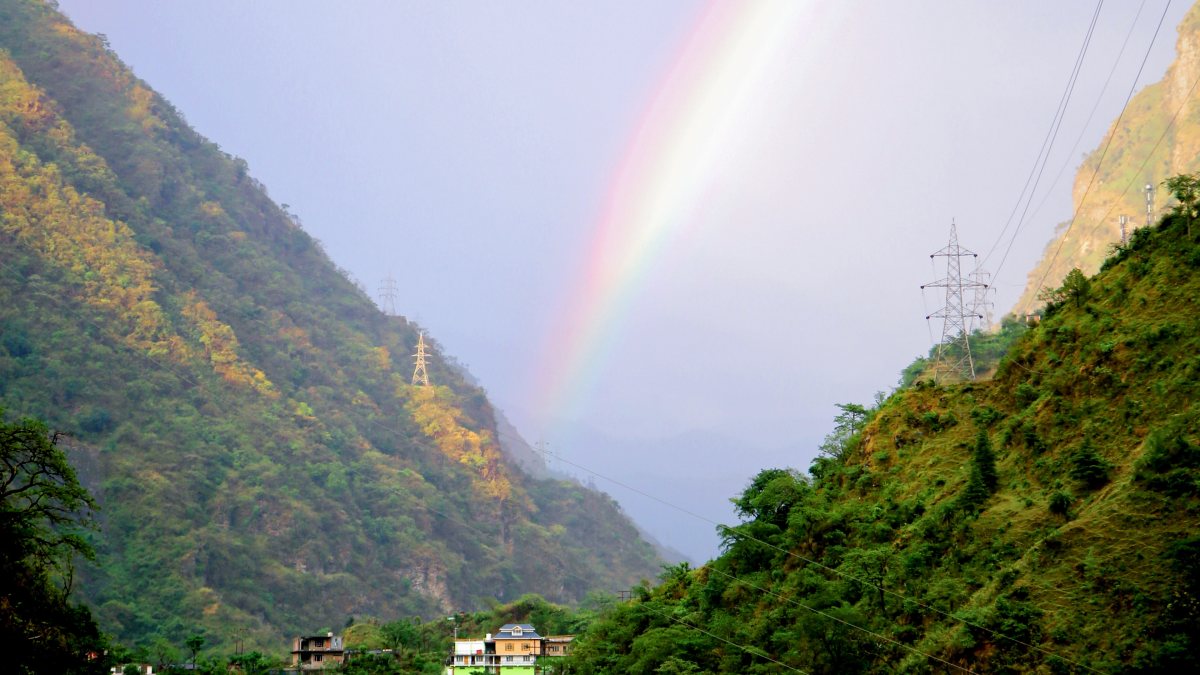 Rainbow graces sky over mountains on Mandi-Kullu route