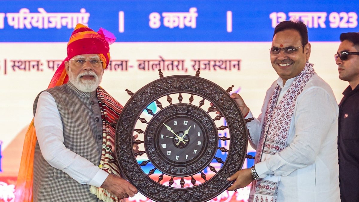Prime Minister Narendra Modi greets during the inauguration and foundation…