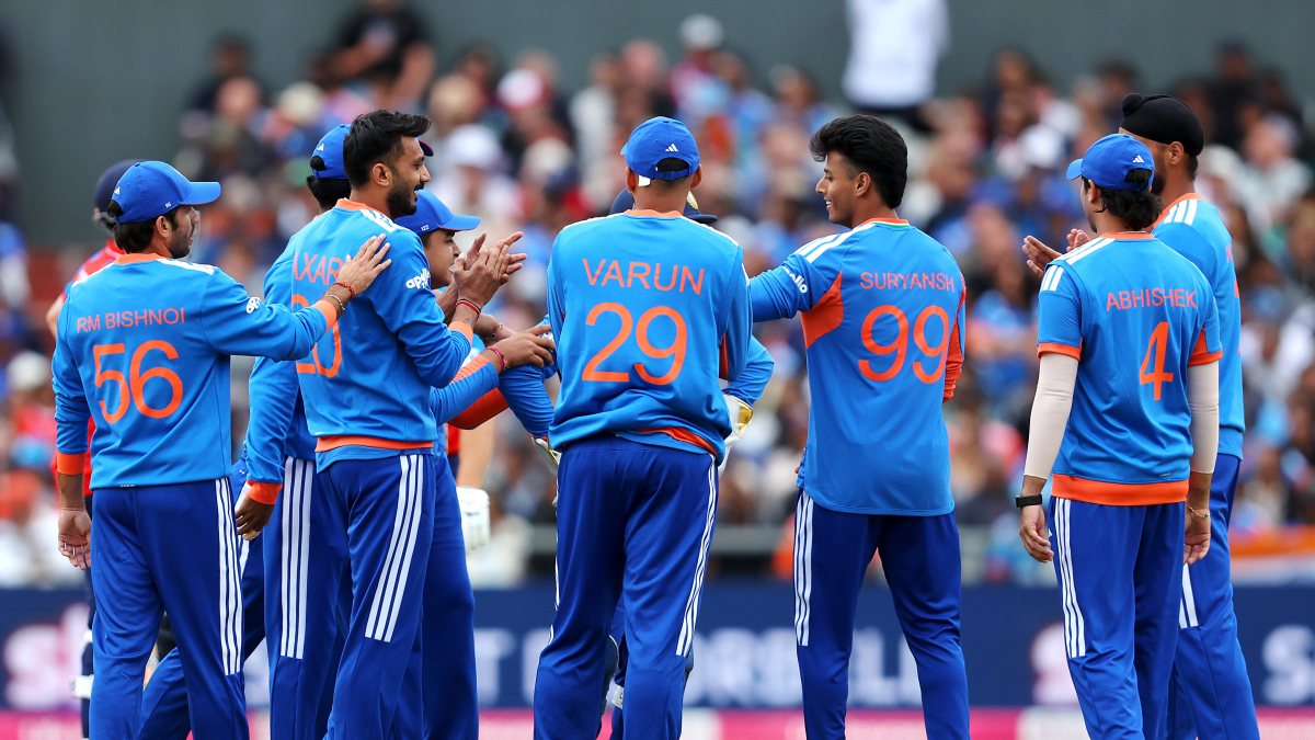 India's Axar Patel with his teammates celebrates after dismissing English…