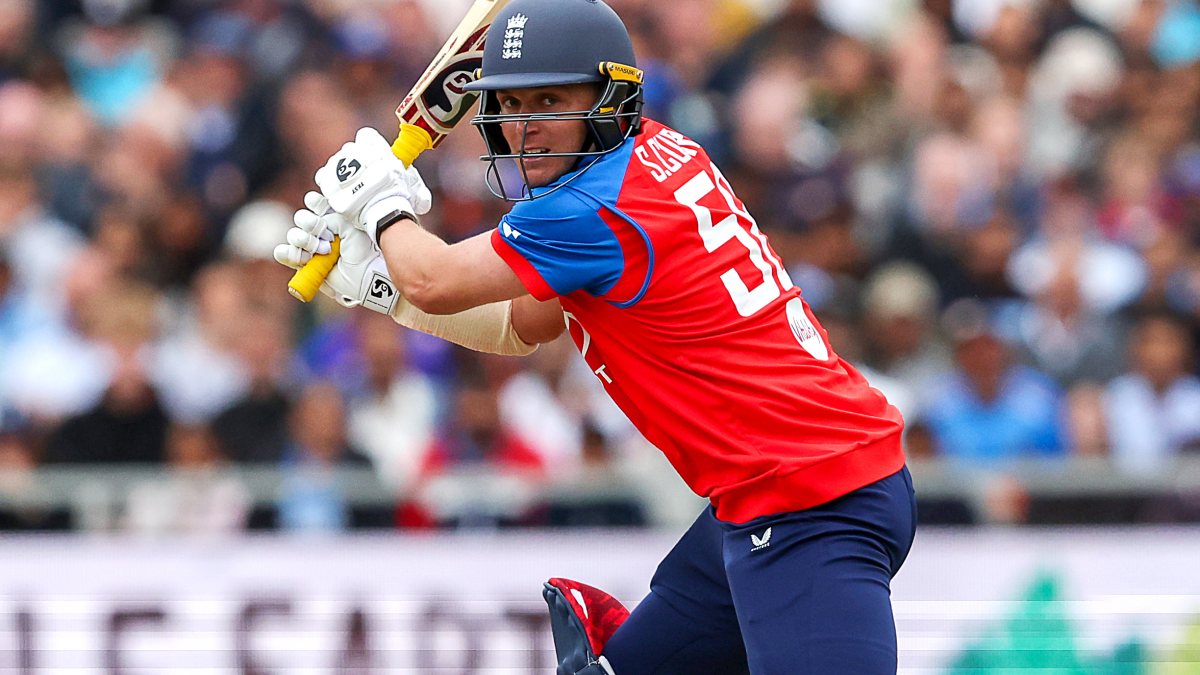 England's Sam Curran plays a shot during the 2nd T20I against India, at…