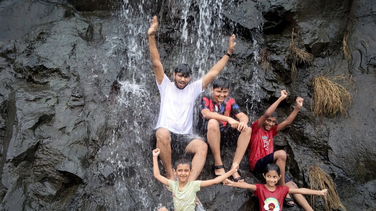 People enjoy at Mumbra Hills waterfalls in Thane