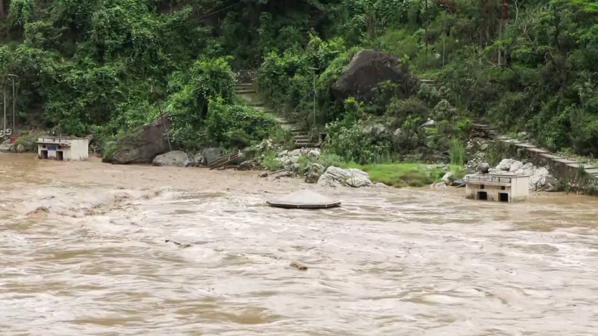 Swollen Mandakini river gushes at confluence with Alaknanda