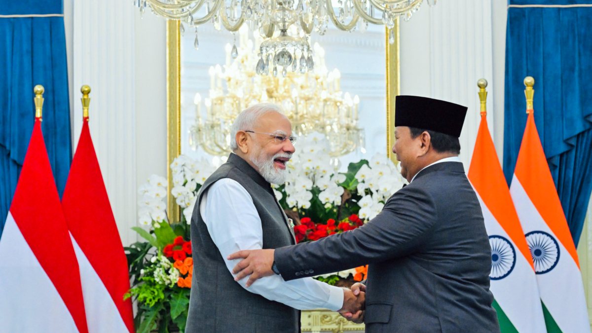Prime Minister Narendra Modi shakes hands with Indonesian President Prabowo…