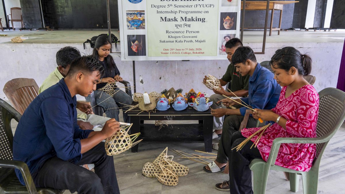 Students participate in a traditional mask-making workshop during an internship…