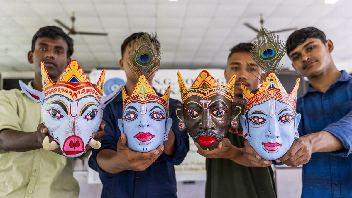 Students display handmade masks at Golaghat college workshop