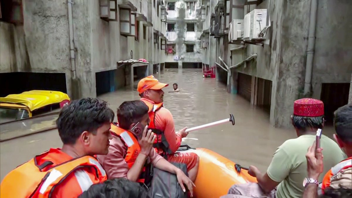 NDRF and police rescue people in waterlogged Surat amid heavy rain