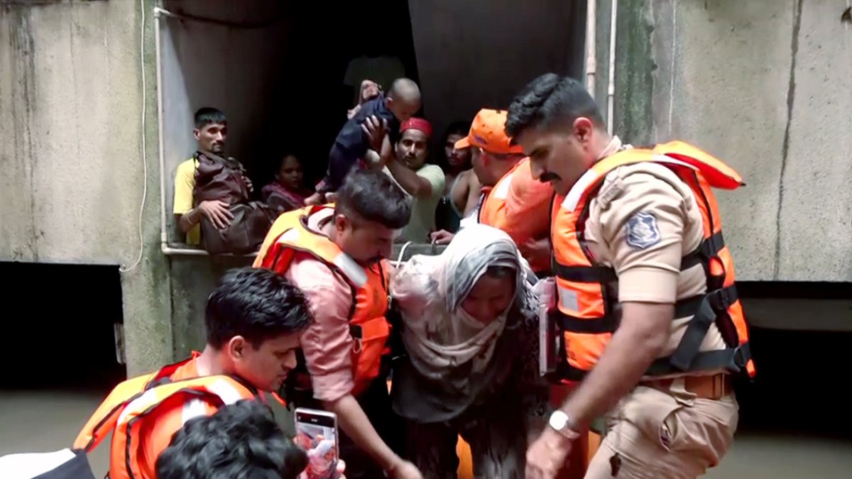 NDRF and police rescue people in waterlogged Surat amid heavy rain
