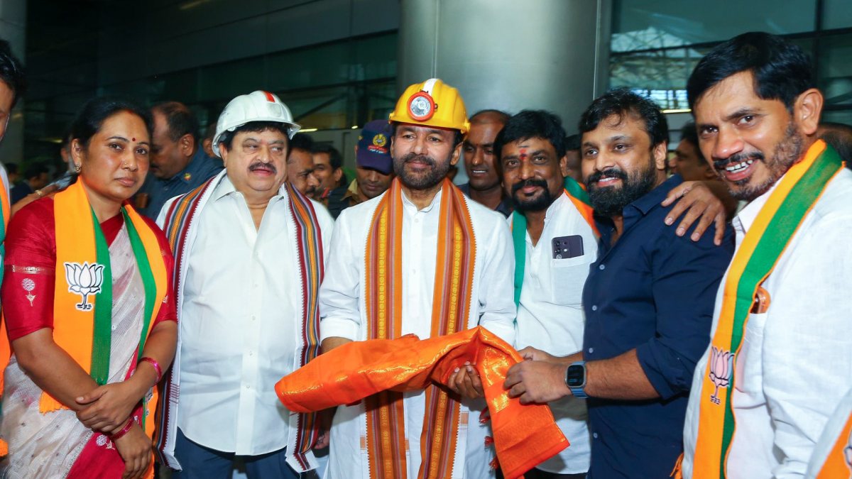 BJP workers welcome Union Minister G Kishan Reddy at Hyderabad airport