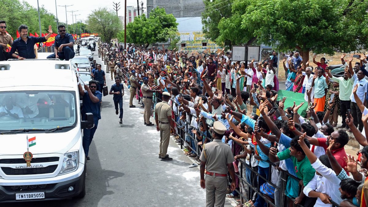 Tamil Nadu Chief Minister C. Joseph Vijay waves as he receives a warm welcome…