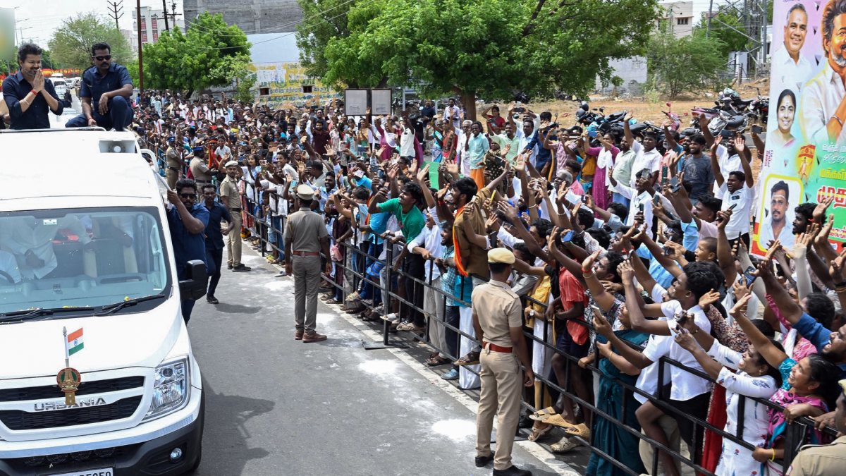 Tamil Nadu Chief Minister C. Joseph Vijay greets people as he receives a warm…