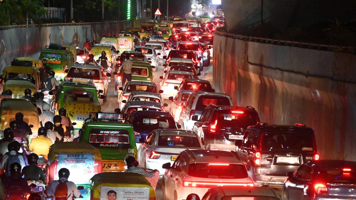 Vehicles move slowly amid a heavy traffic jam on Nehru Path, in Patna on Friday.